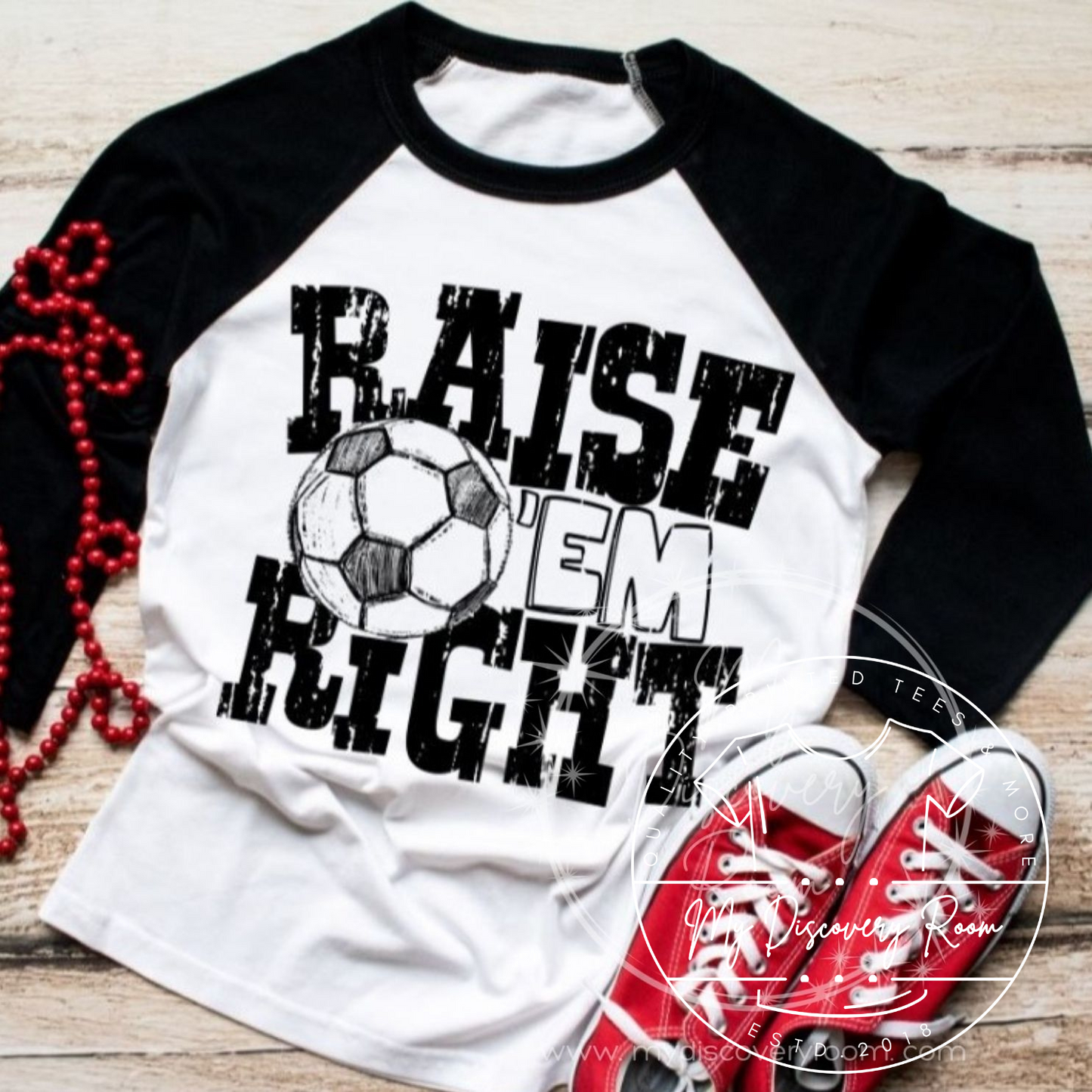 Raise ‘Em Right Soccer Distressed Block Letter Graphic Tee