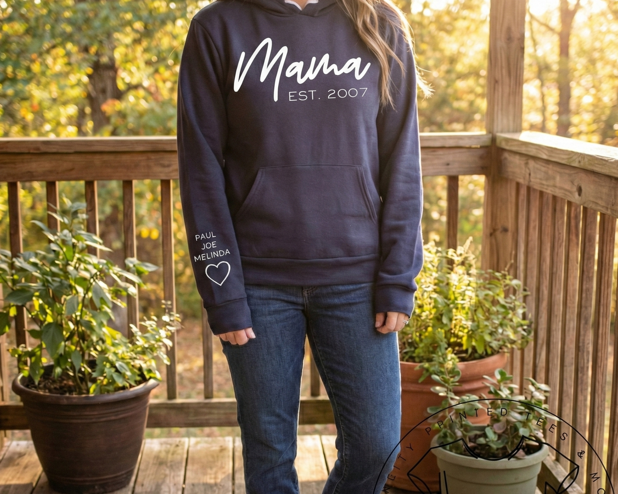 Woman standing on a deck in a Personalized Mama Sweatshirt