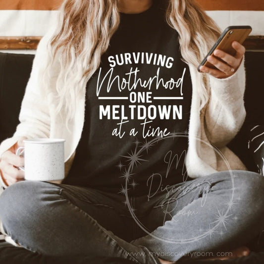 Surviving Motherhood One Meltdown At A Time (style 1) Graphic Tee - MyDiscoveryRoom