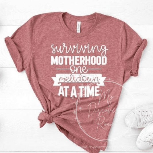 Surviving Motherhood One Meltdown At A Time (Style 2) Graphic Tee - MyDiscoveryRoom